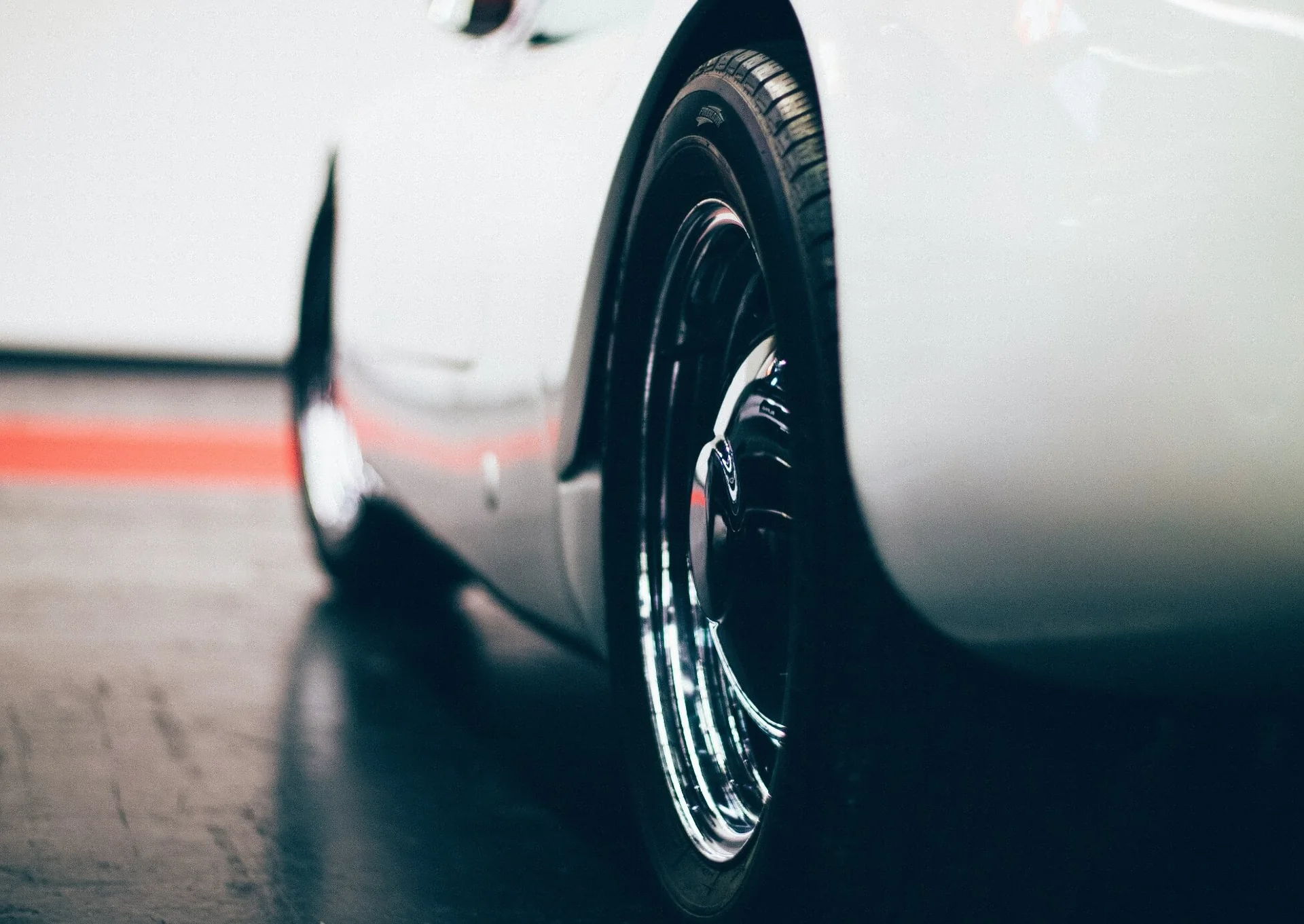 A close view of a vehicle wheel and bodywork