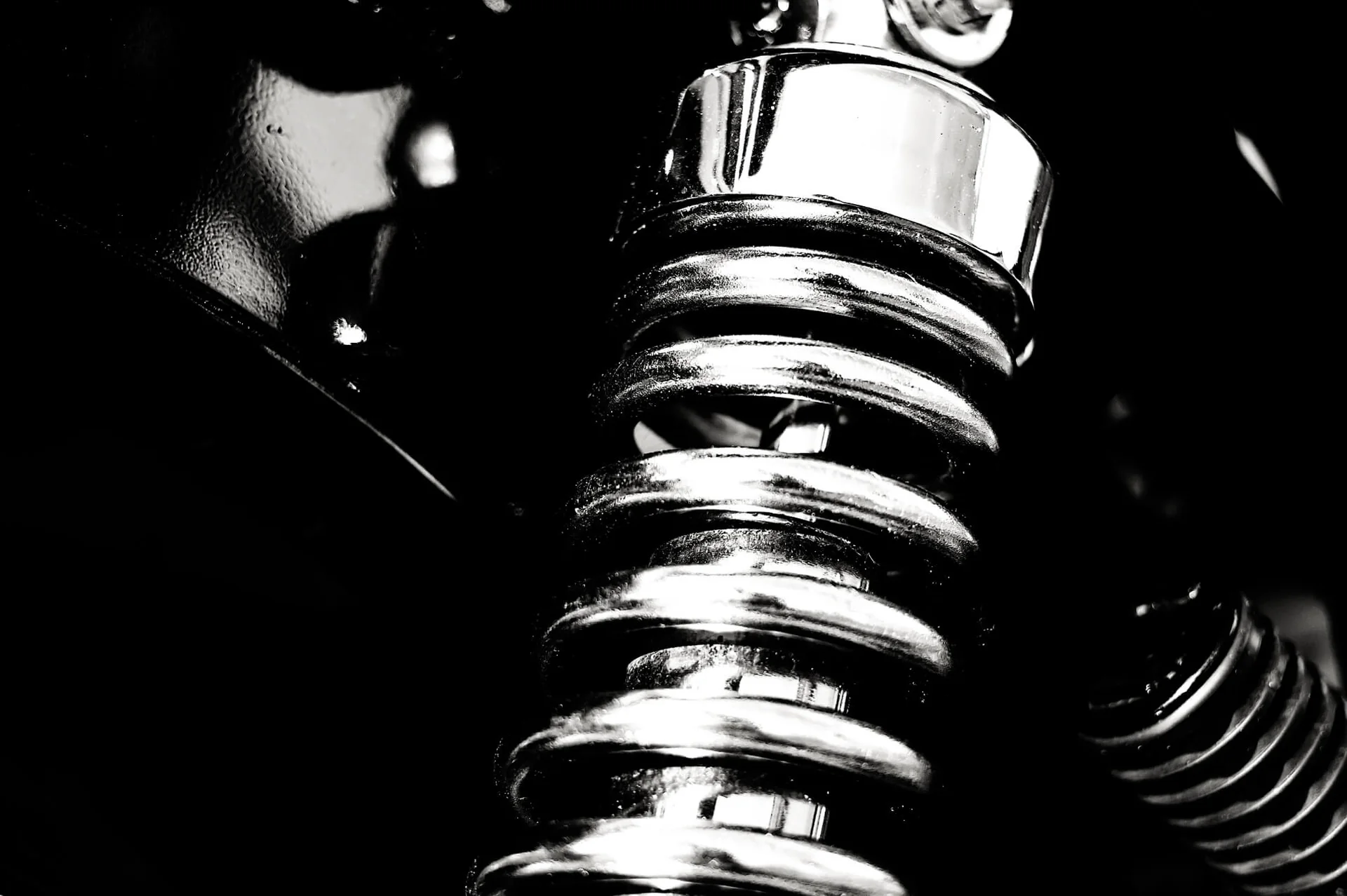Close-up of a suspension spring and damper